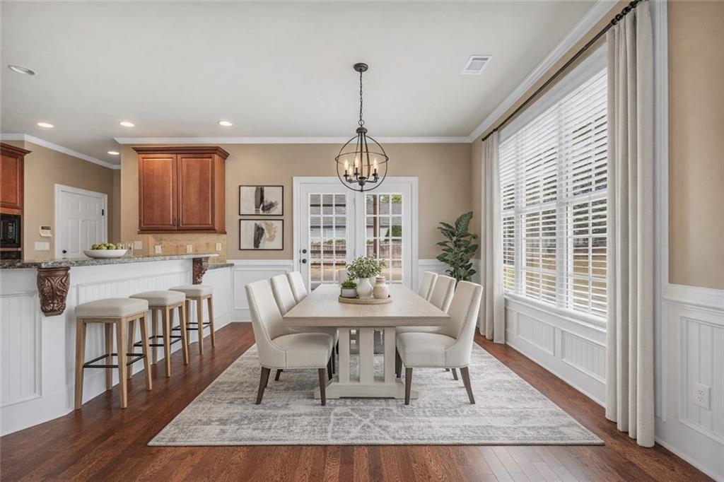 108 Caraway Road Locust Grove, GA 30248 - Photo 10 of 50 a view of a dining room with furniture window and wooden floor