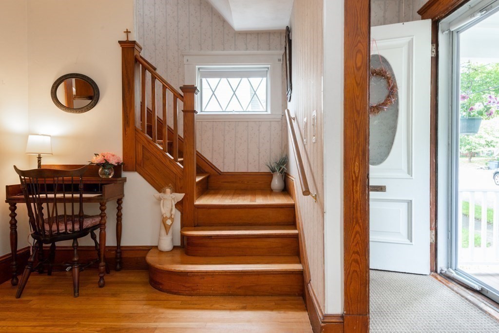 25 Porter Street Danvers, MA 01923 - Photo 15 of 42 a view of entryway and hall with wooden floor