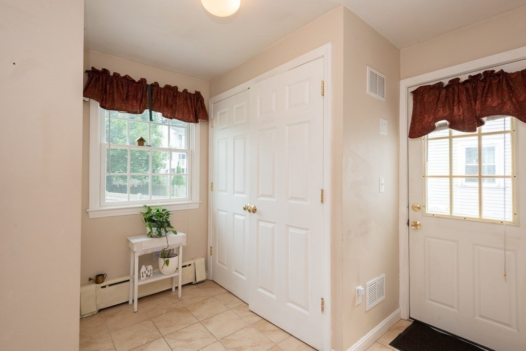 25 Porter Street Danvers, MA 01923 - Photo 26 of 42 a view of an entryway with wooden floor