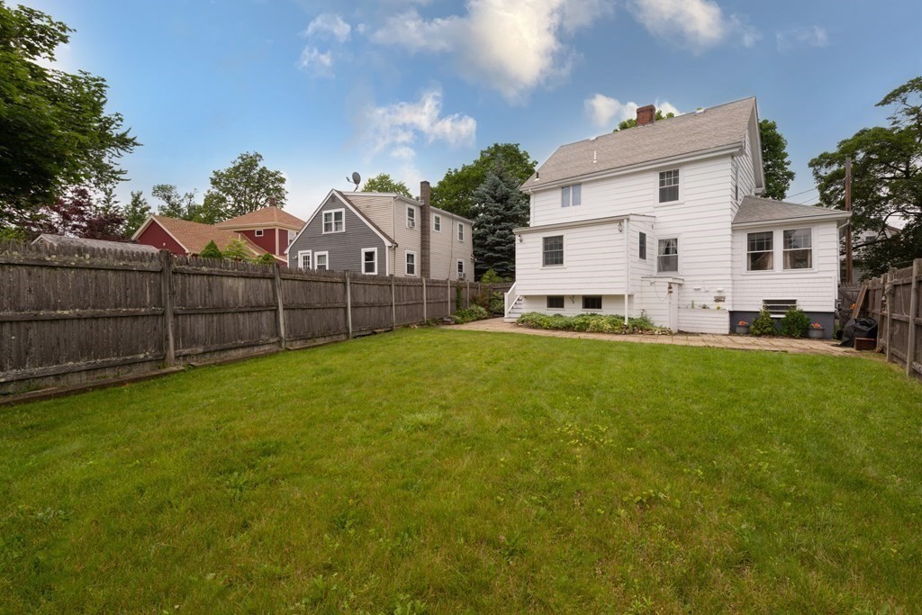 25 Porter Street Danvers, MA 01923 - Photo 3 of 42 a view of a house with a yard and sitting area