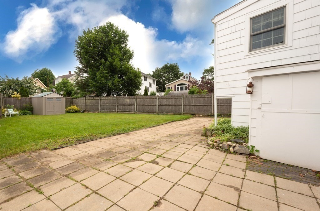25 Porter Street Danvers, MA 01923 - Photo 8 of 42 a view of a backyard with a garden