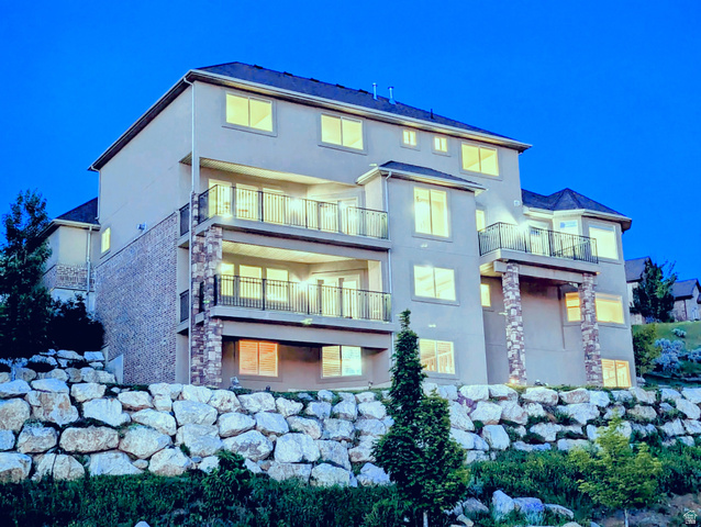 1596 Millbrook Way Bountiful, UT 84010 - Photo 10 of 116 Multi-level residential structure featuring stucco siding and a dark shingle roof