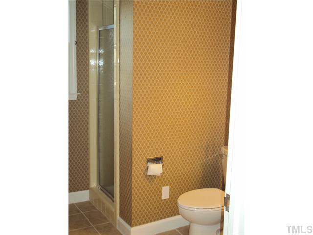 1007 Country Ridge Drive Raleigh, NC 27609 - Photo 8 of 14 a bathroom with a toilet