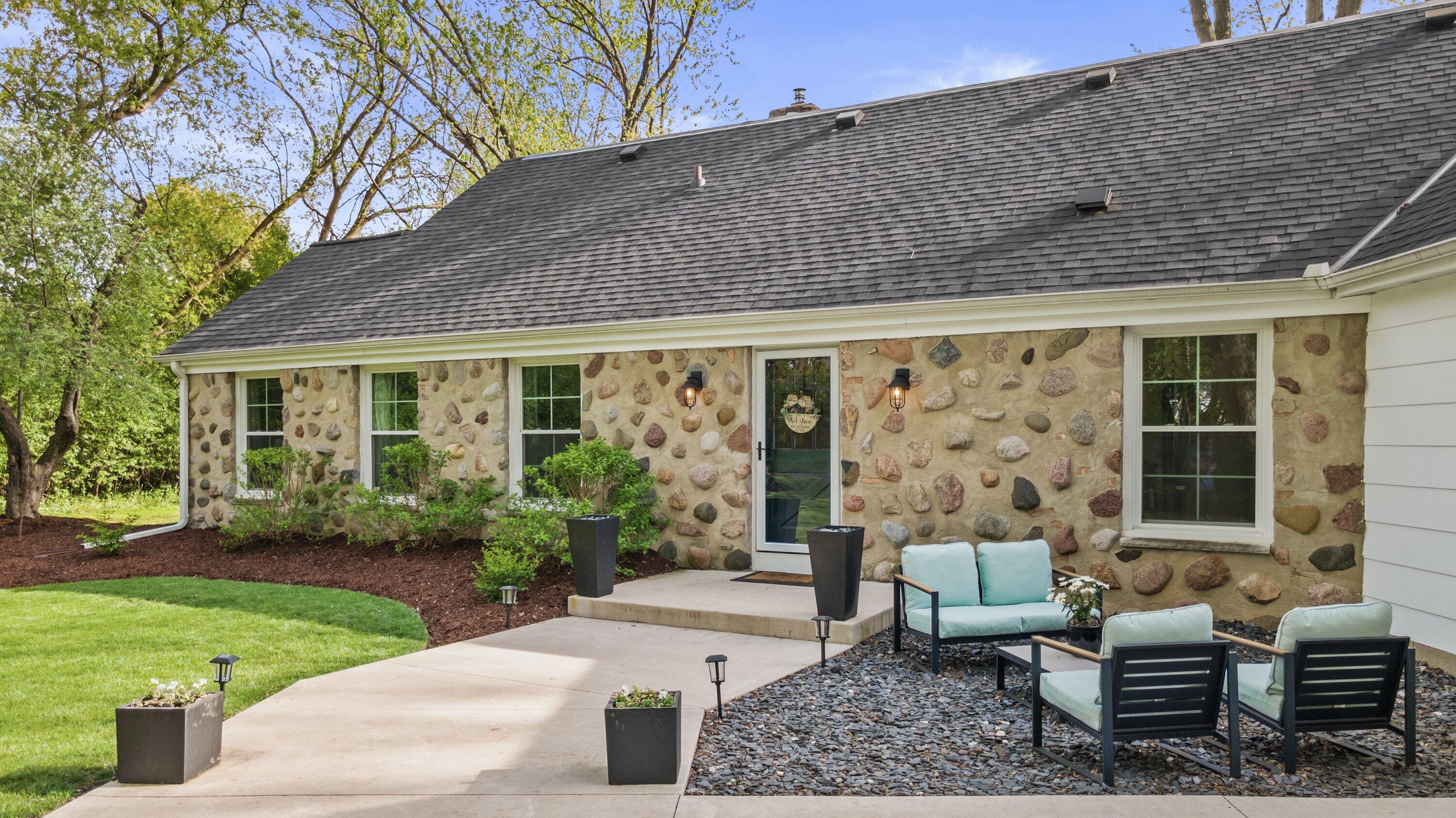 1005 Lone Tree Road Elm Grove, WI 53122 - Photo 1 of 35 charming stone exterior