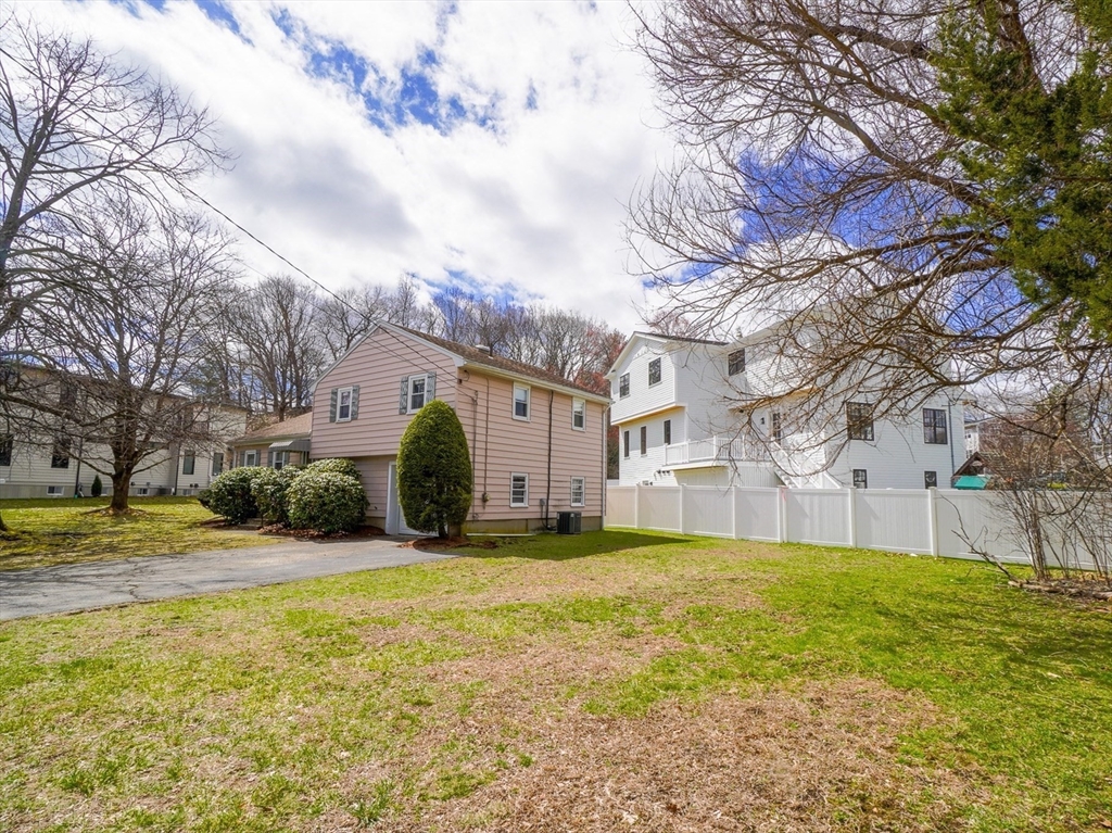 53 Yale Road Needham, MA 02494 - Photo 4 of 21 a view of a house with a yard