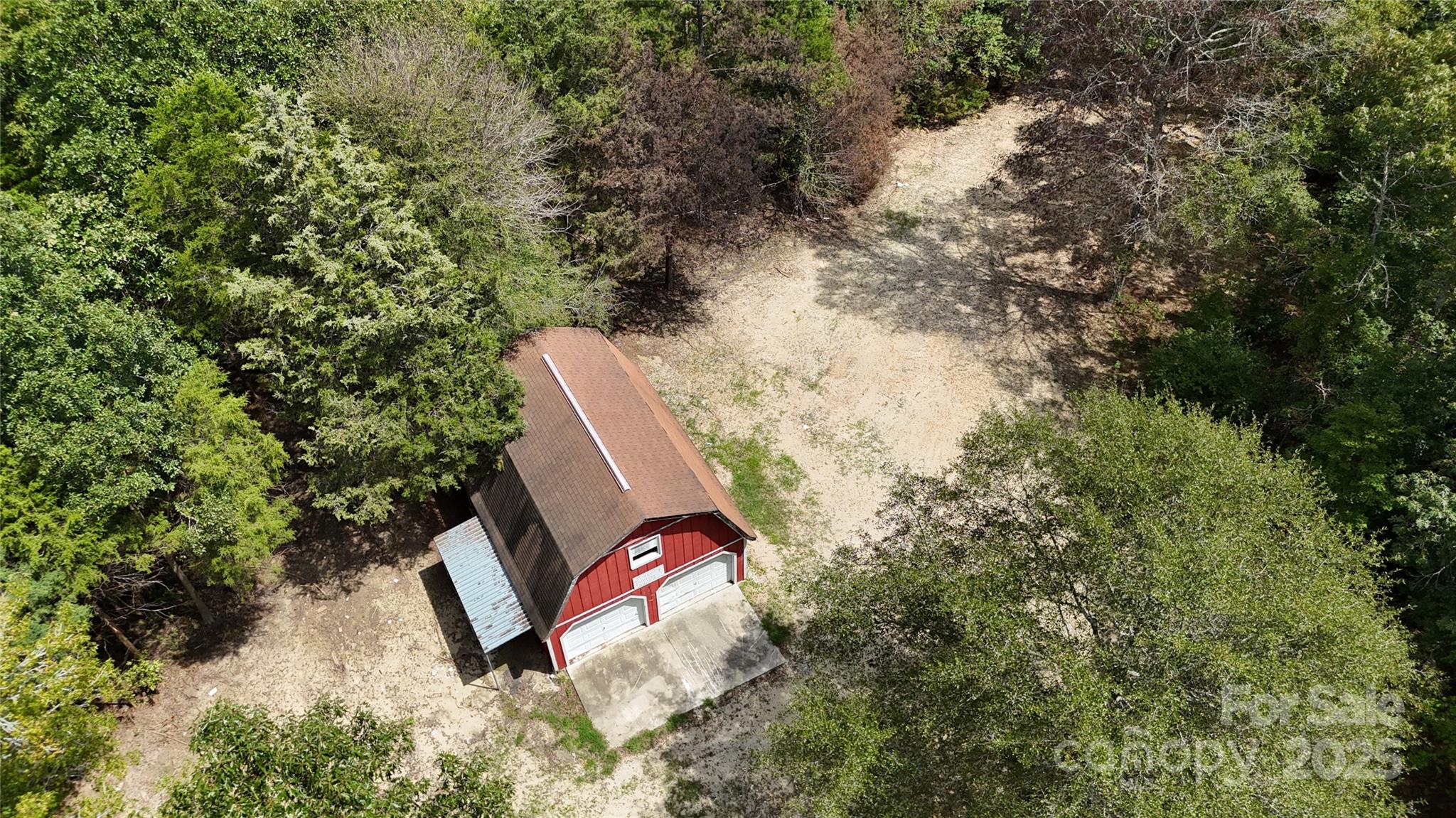 4817 Blade Run Road Edgemoor, SC 29712 - Photo 7 of 15 a view of a yard with wooden fence and plants