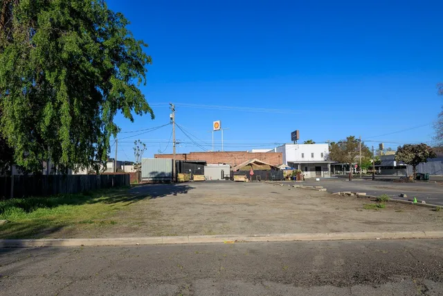 a view of a town with barn house