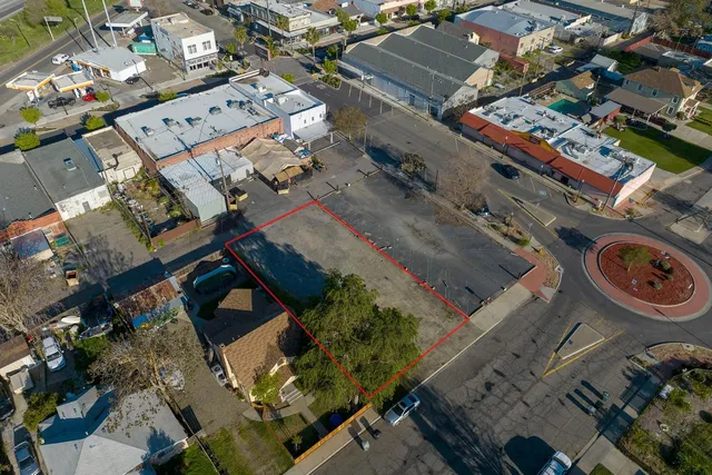 an aerial view of a house with a ocean view