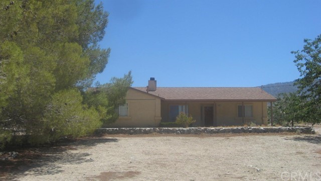1277 Locust Road Pinon Hills, CA 92372 - Photo 1 of 1 front view of a house
