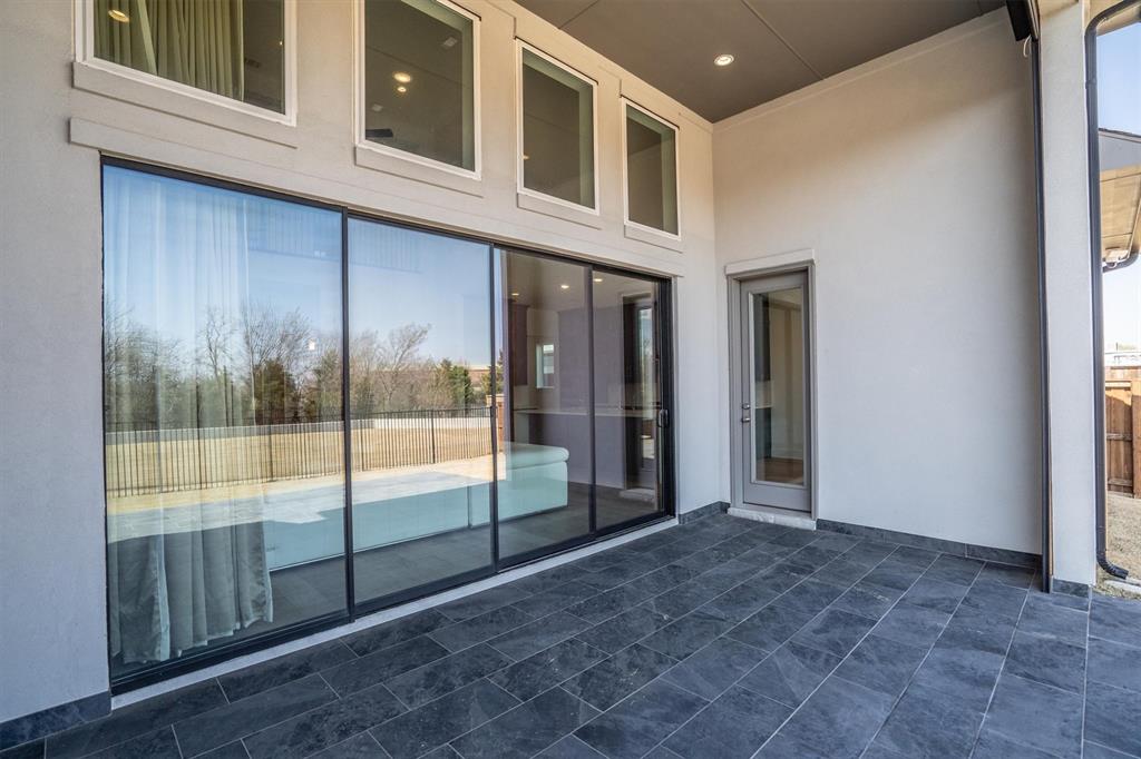 1161 Rochester Place Copper Canyon, TX 75077 - Photo 18 of 39 With a sliding door across the back of the home, you can enjoy peaceful morning sunrises from the family room or from the tiled, extended patio