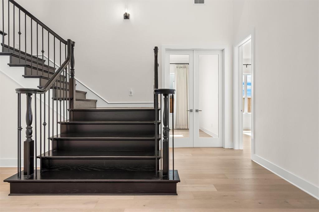 1161 Rochester Place Copper Canyon, TX 75077 - Photo 22 of 39 The guest room and office are located at the front of the home, separate from the primary bedroom and living spaces