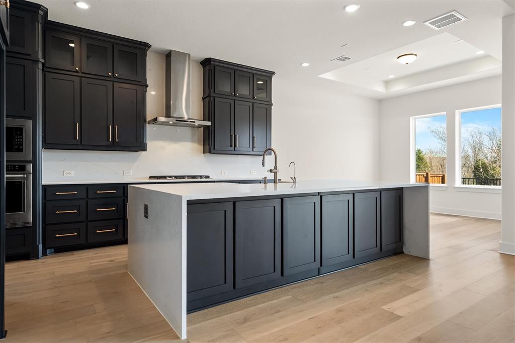 1161 Rochester Place Copper Canyon, TX 75077 - Photo 27 of 39 Large kitchen island with seating for the whole family.
