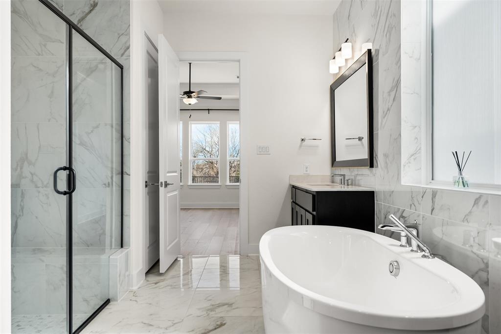 1161 Rochester Place Copper Canyon, TX 75077 - Photo 4 of 39 Spa like primary bathroom with floor to ceiling backsplash