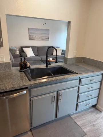 a view of a livingroom with furniture and window
