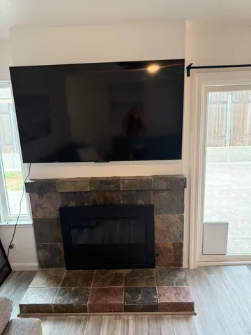 a living room with a fireplace