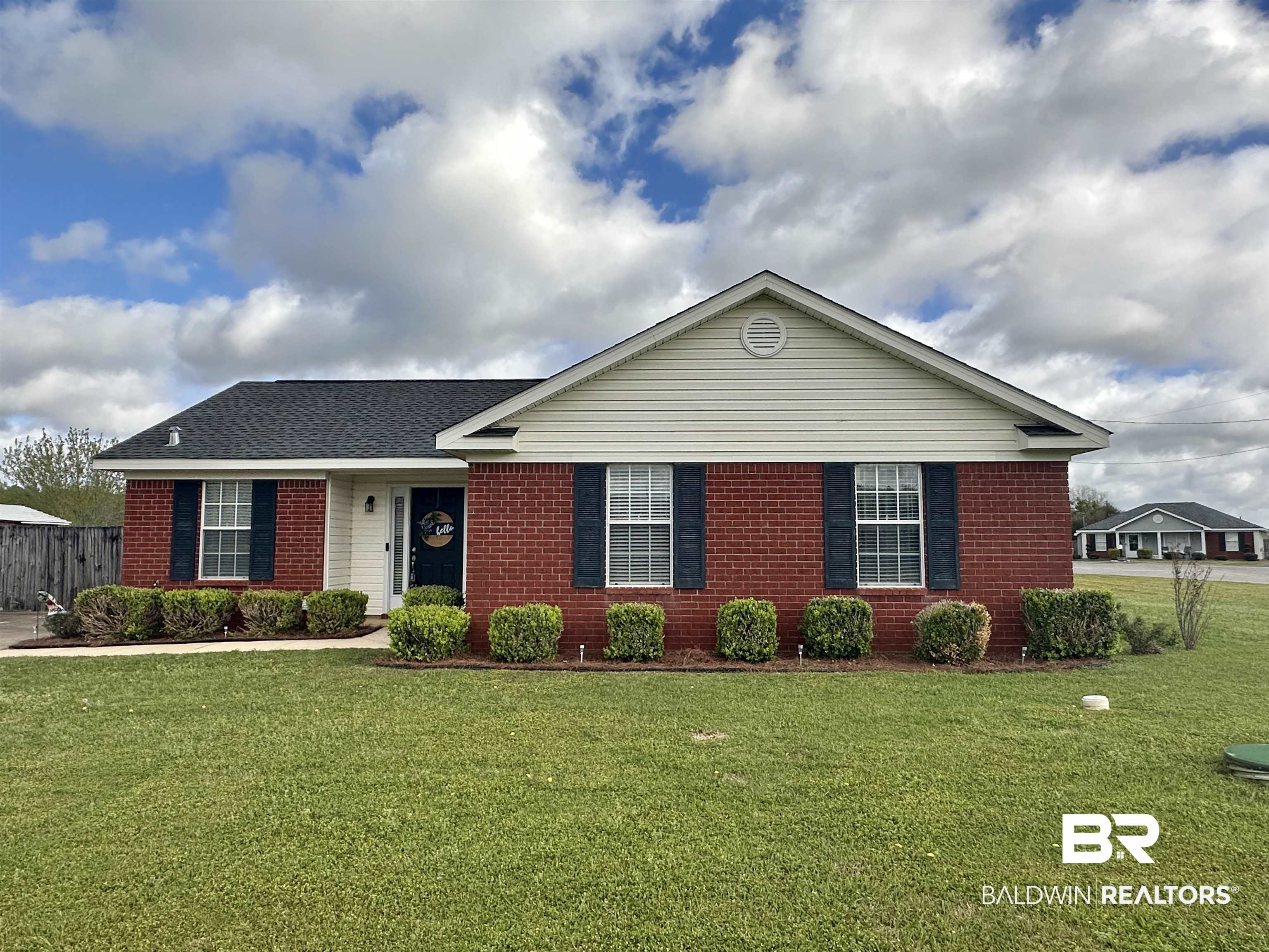 4882 Rebecca Place Mobile, AL 36695 - Photo 3 of 29 Ranch-style house with brick siding, roof with shingles, and a front yard