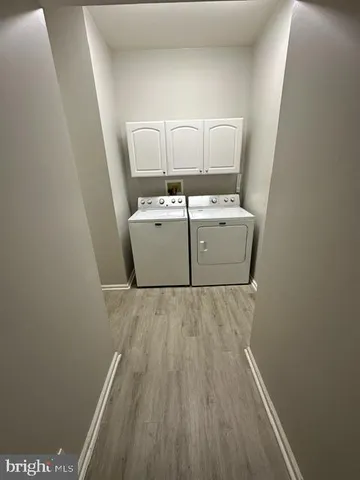 a room with a washer and dryer