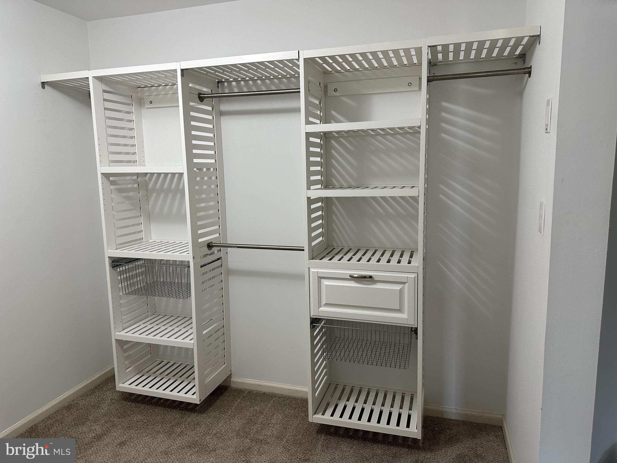 5128 Barness Court Doylestown, PA 18902 - Photo 19 of 27 a room with a walk in closet and a window