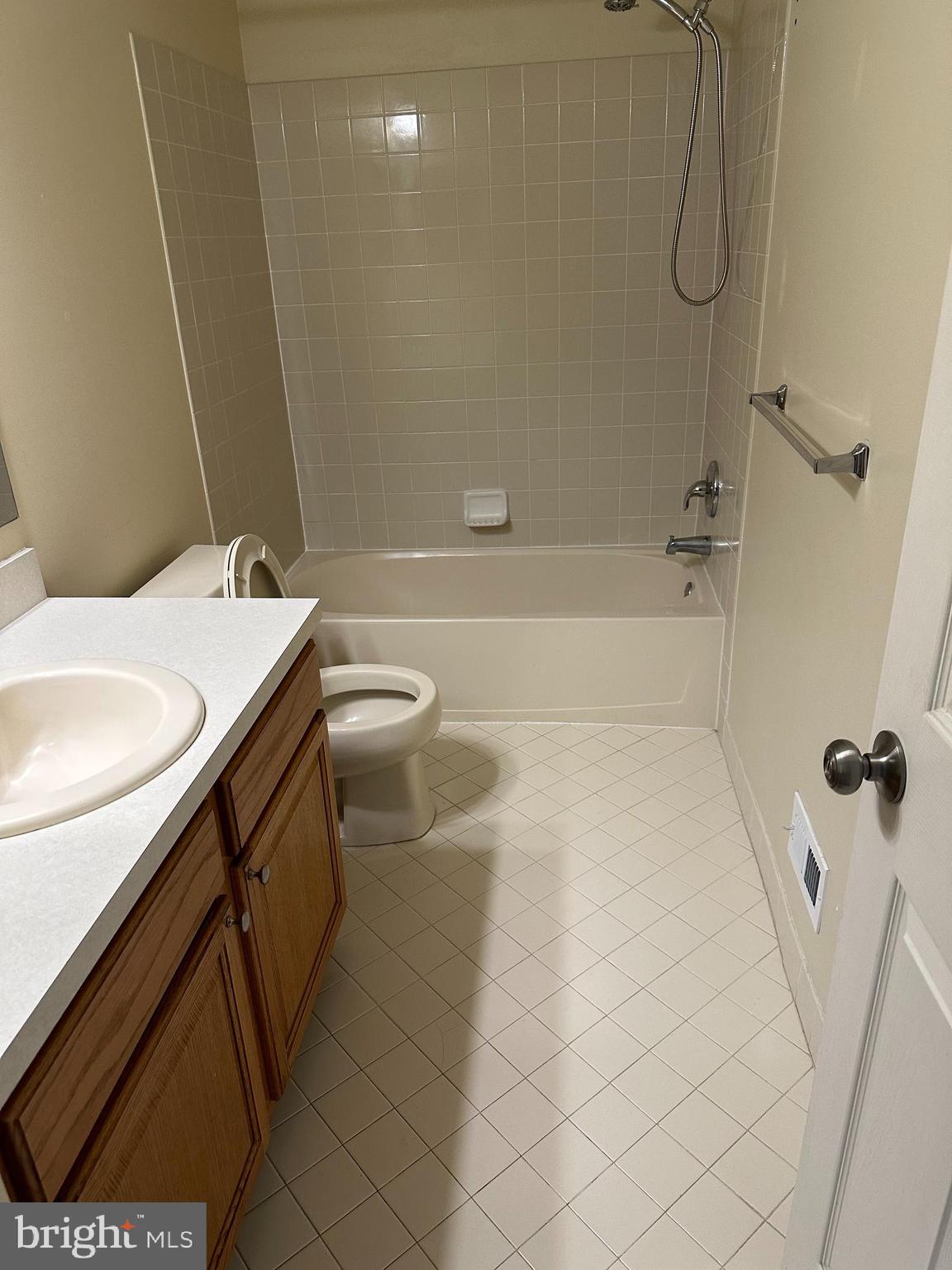 5128 Barness Court Doylestown, PA 18902 - Photo 21 of 27 a bathroom with a sink a toilet and shower