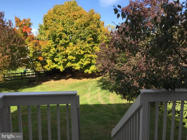 a view of a balcony with an outdoor space