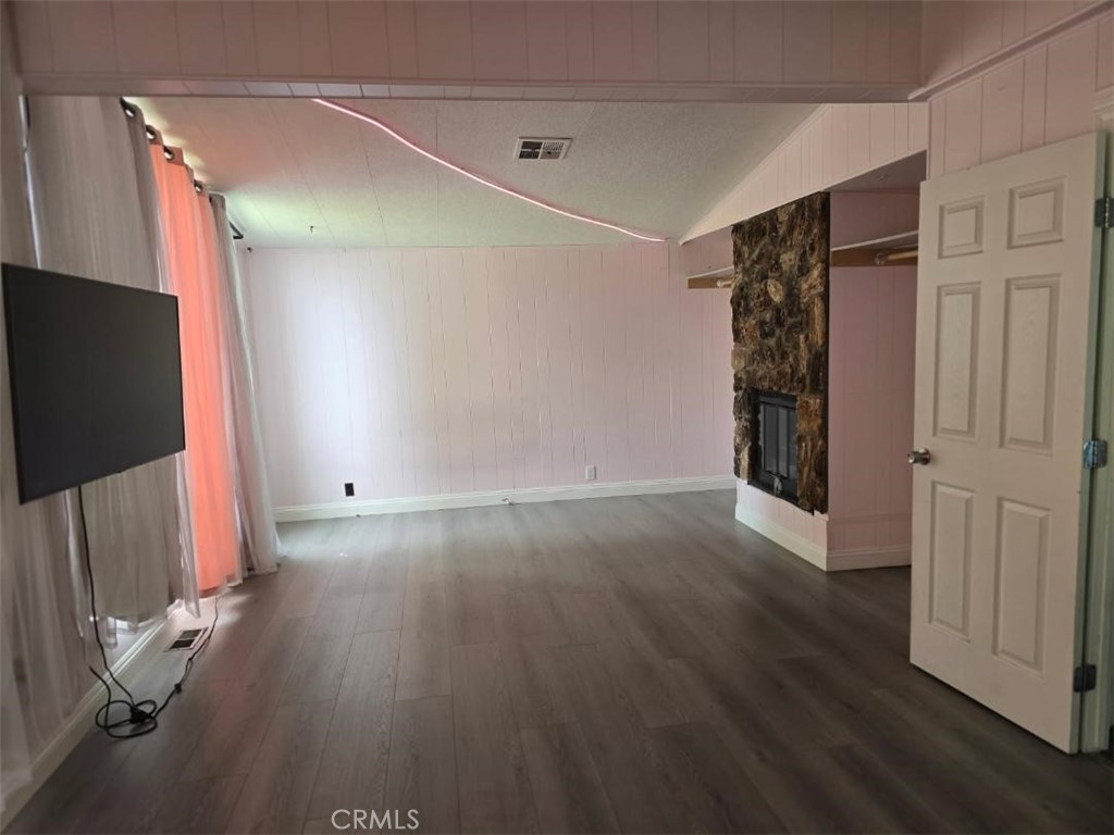 1919 West Coronet Avenue, Unit 1 Anaheim, CA 92801 - Photo 5 of 21 Living room with fireplace