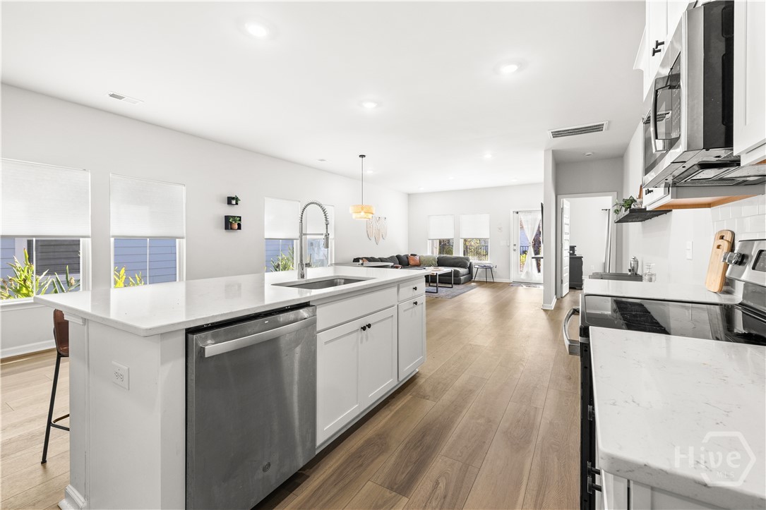 119 Holloway Hill Pooler, GA 31322 - Photo 20 of 59 Sink in the island with stainless steel dishwasher