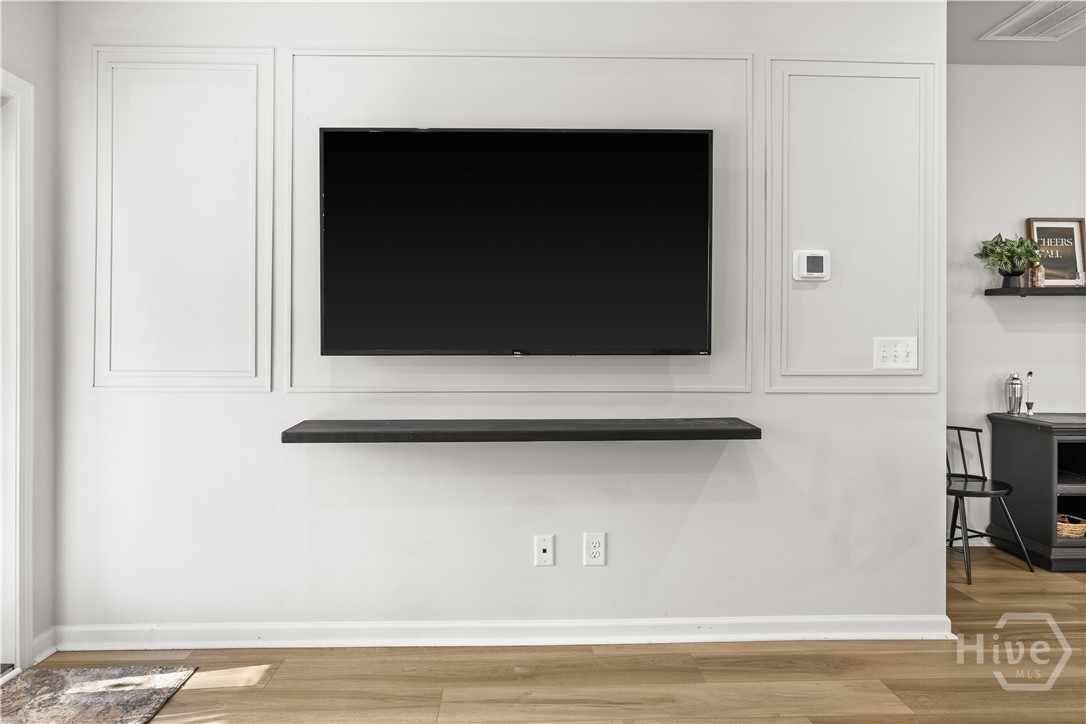 119 Holloway Hill Pooler, GA 31322 - Photo 32 of 59 Mounted TV with custom framing around