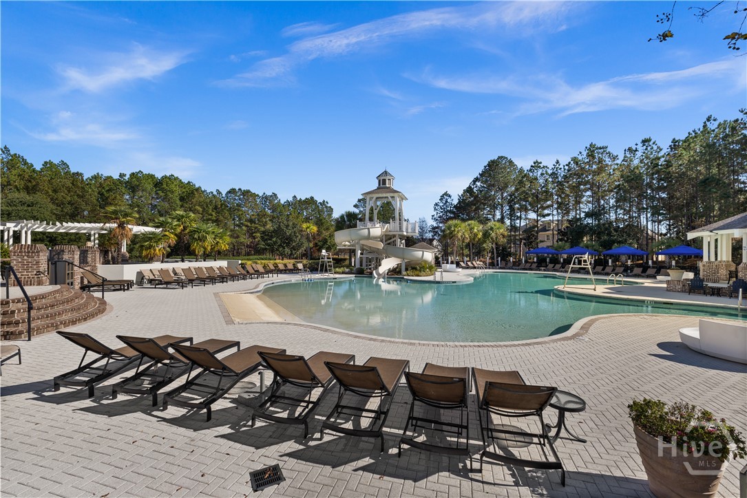 119 Holloway Hill Pooler, GA 31322 - Photo 51 of 59 Plenty of seating for relaxing by the pool