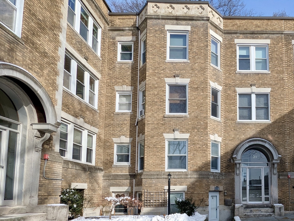 21 Westbourne Terrace, Unit 3 Brookline, MA 02446 - Photo 3 of 23 a view of a brick building with large windows