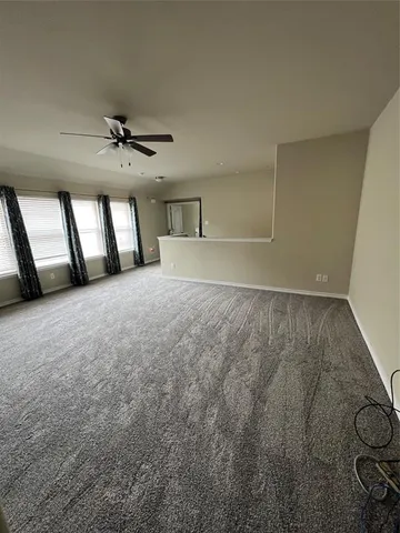 a view of a livingroom with a staircase