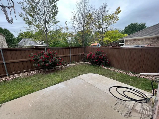 a view of backyard with green space