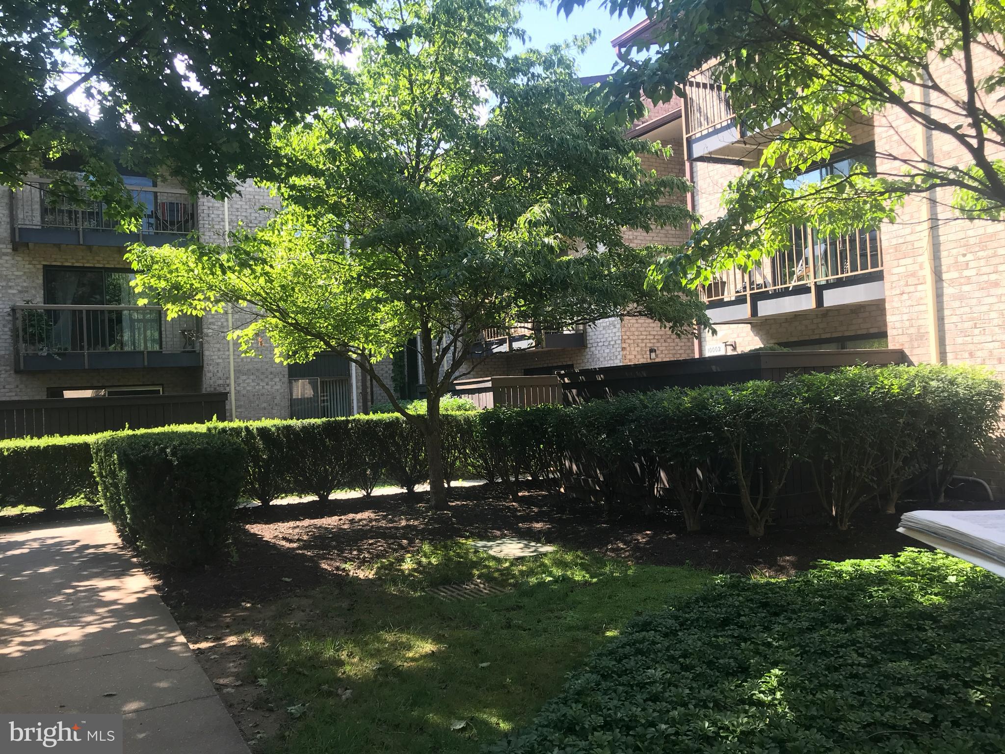 10002 Stedwick Road, Unit 304 Gaithersburg, MD 20886 - Photo 13 of 14 Balcony Overlooks Garden Areas.