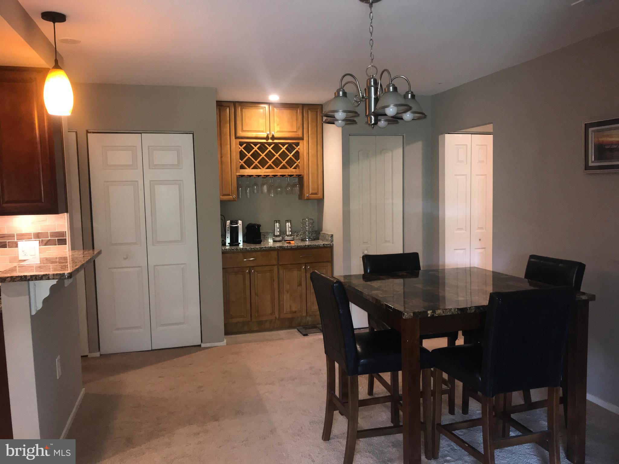 10002 Stedwick Road, Unit 304 Gaithersburg, MD 20886 - Photo 5 of 14 Dining Room/Coffee Bar