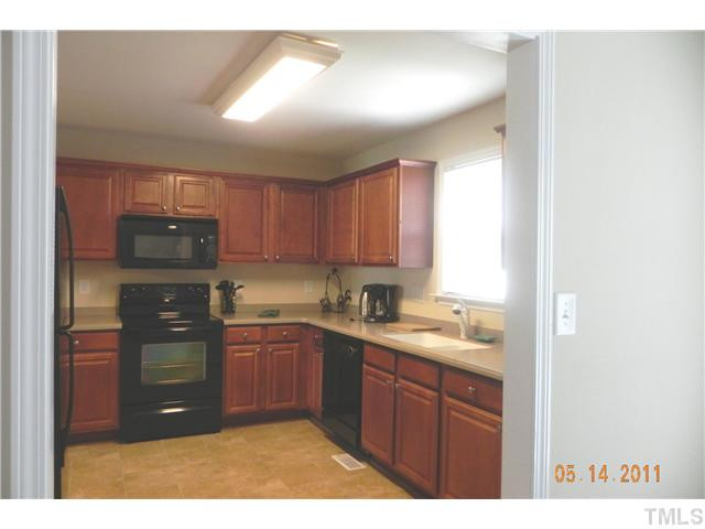 114 Clayton Road Angier, NC 27501 - Photo 8 of 16 Smooth top range, build-in microwave, dishwasher and refrigerator Kitchen