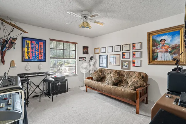 a living room with furniture workspace and a window