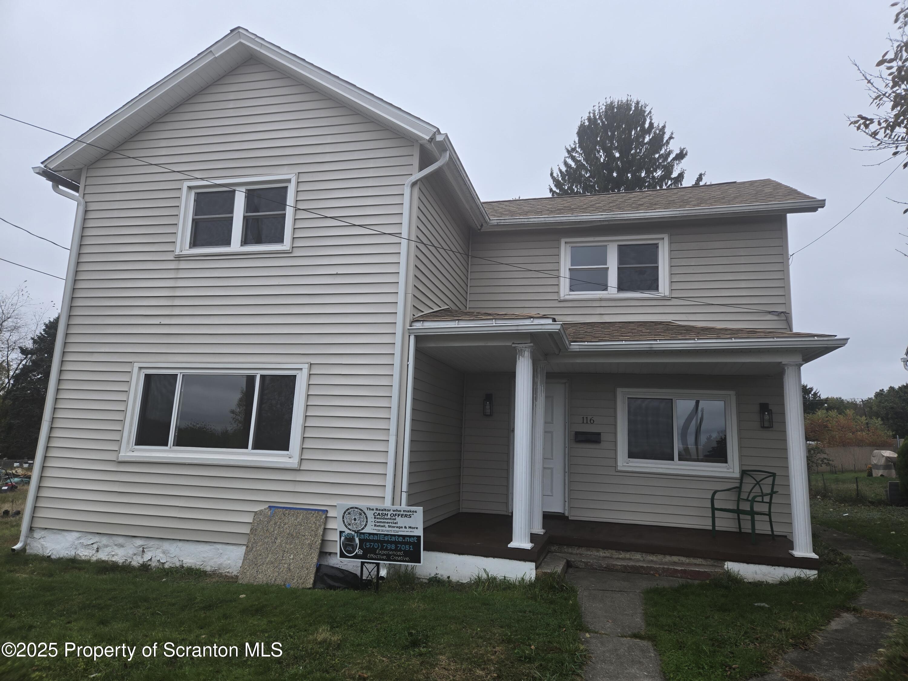 116 Wright Street Duryea, PA 18642 - Photo 1 of 14 a view of a house with a yard