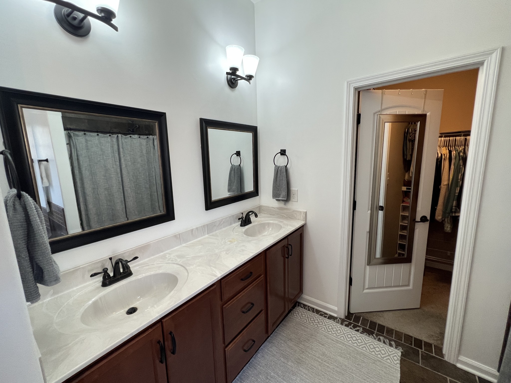3785 Suiter Road Clarksville, TN 37040 - Photo 13 of 21 a bathroom with 2 sink and a mirror