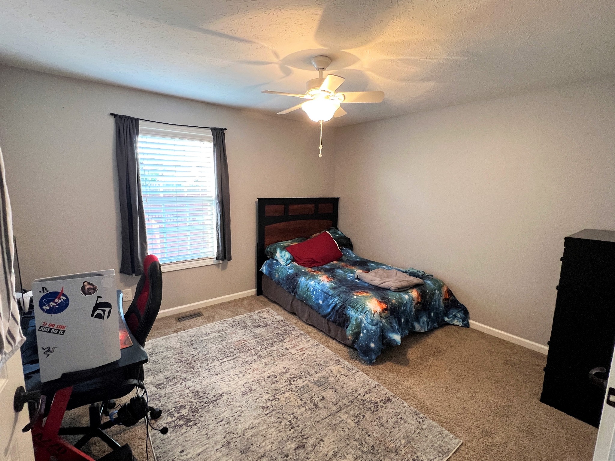 3785 Suiter Road Clarksville, TN 37040 - Photo 14 of 21 a bedroom with a bed and window