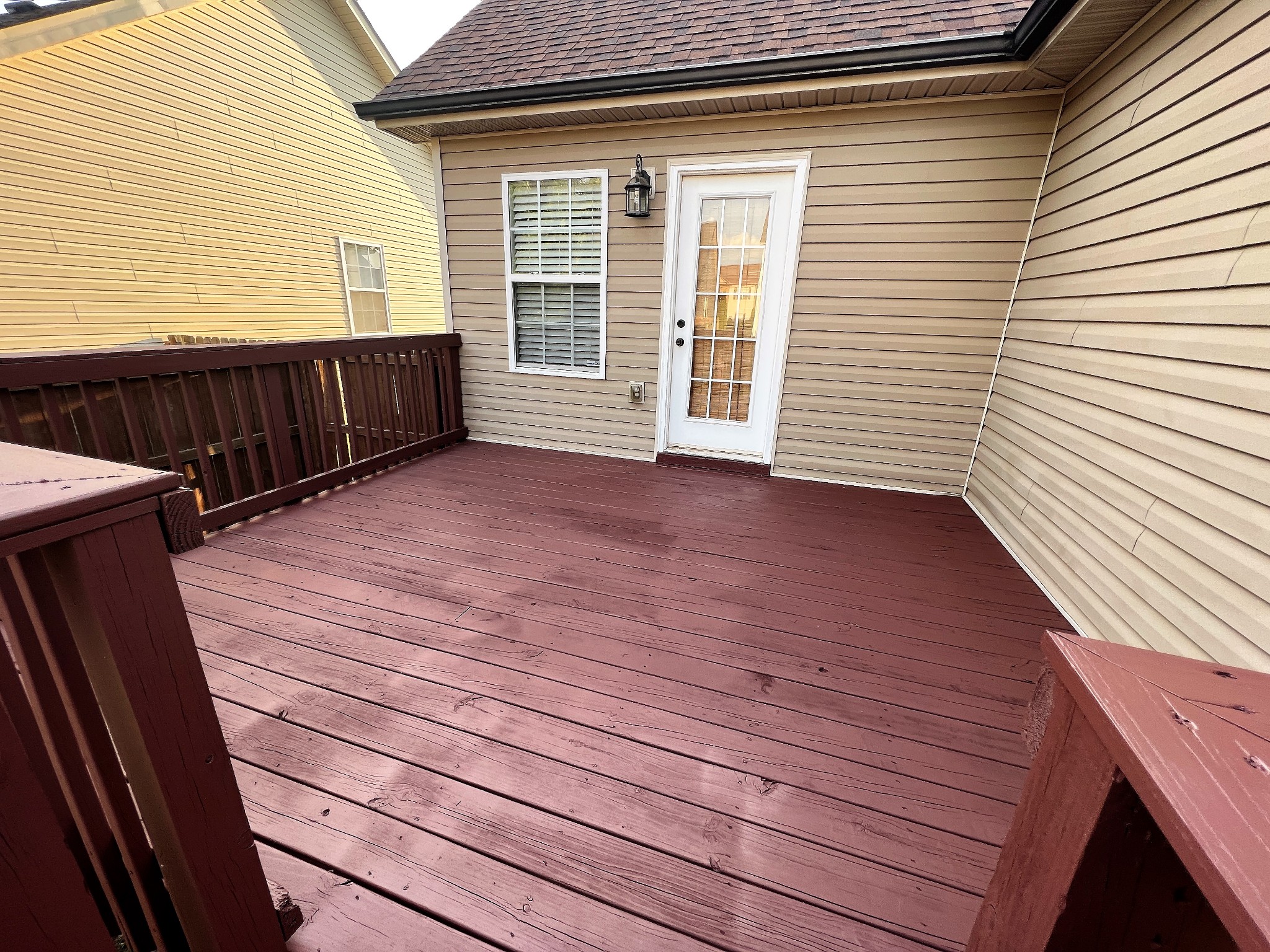 3785 Suiter Road Clarksville, TN 37040 - Photo 21 of 21 a view of a deck with wooden floor and a floor to ceiling window