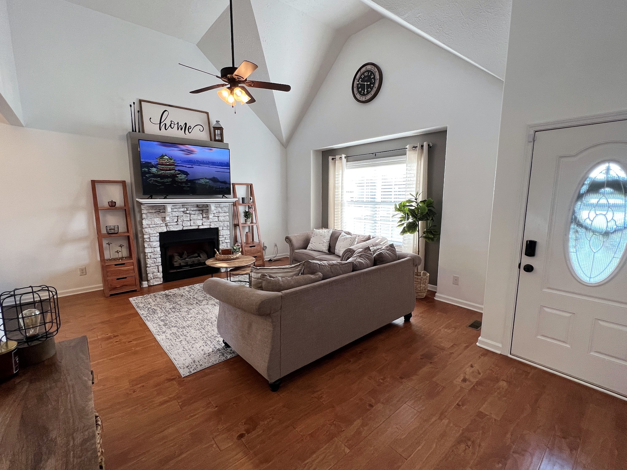 3785 Suiter Road Clarksville, TN 37040 - Photo 5 of 21 a living room with furniture and a fireplace