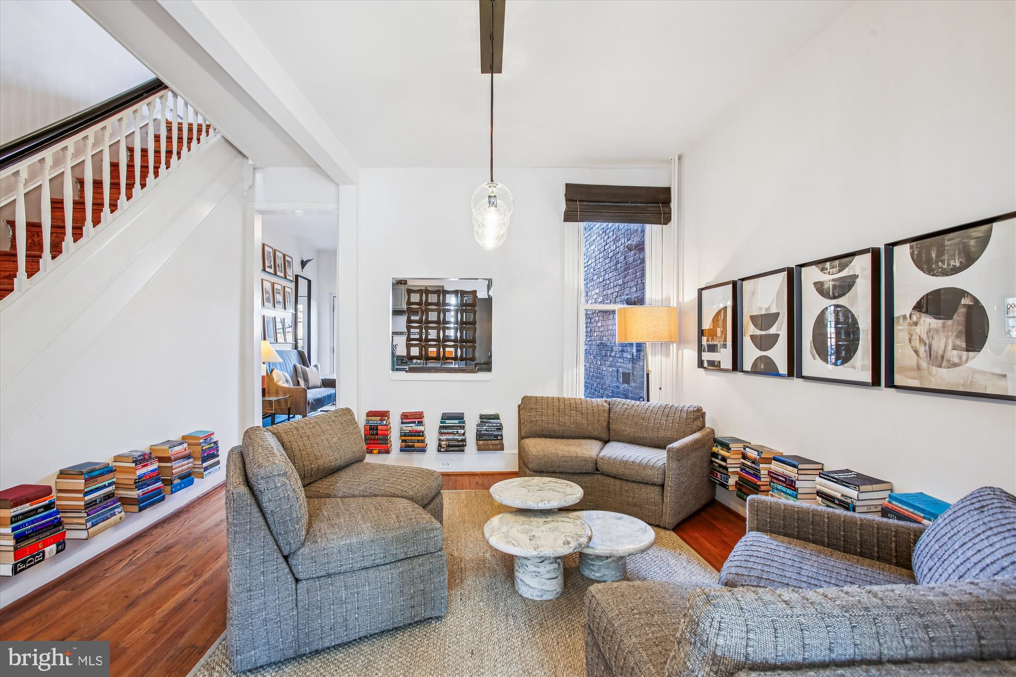 309 Elm Street Northwest Washington, DC 20001 - Photo 23 of 106 a living room with furniture stairs and a window