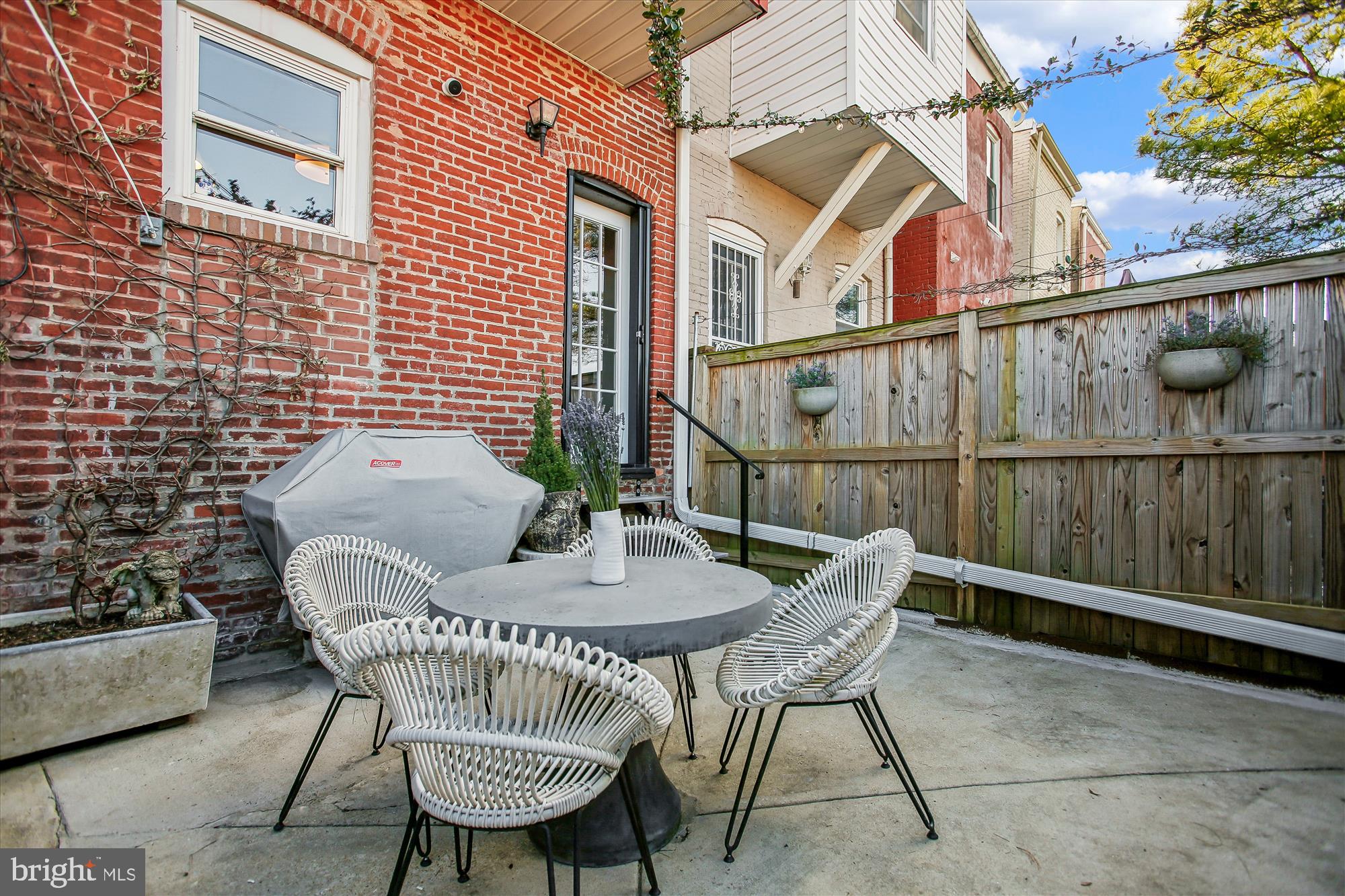 309 Elm Street Northwest Washington, DC 20001 - Photo 36 of 106 a view of a chairs and table in the patio