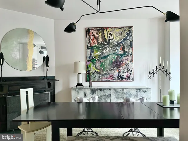 a view of a living room and dining room