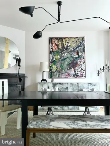 a view of a living room with furniture