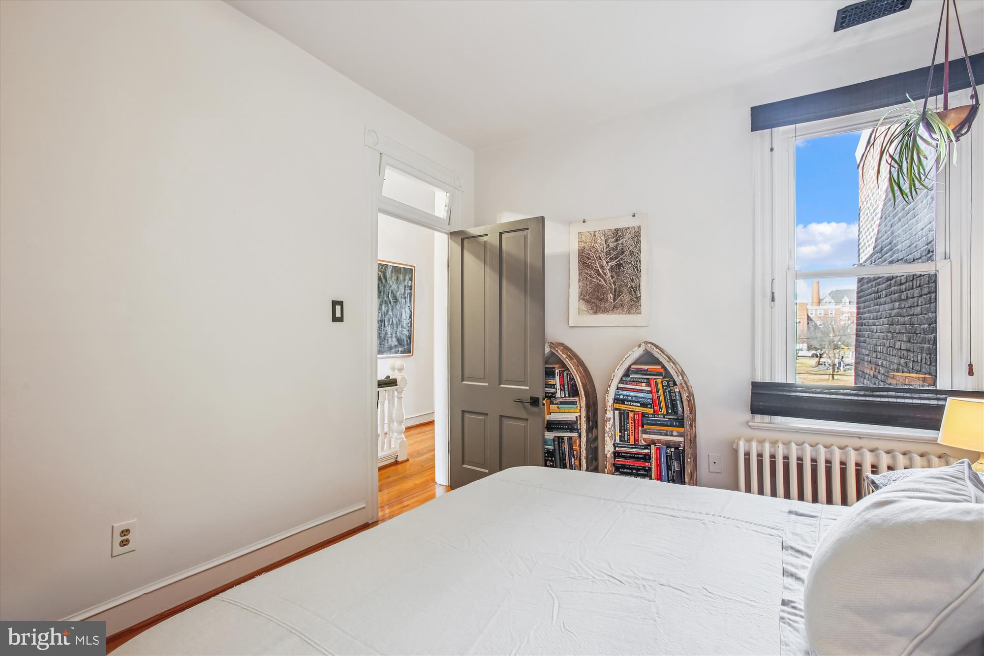 309 Elm Street Northwest Washington, DC 20001 - Photo 62 of 106 a bedroom with a bed and a window