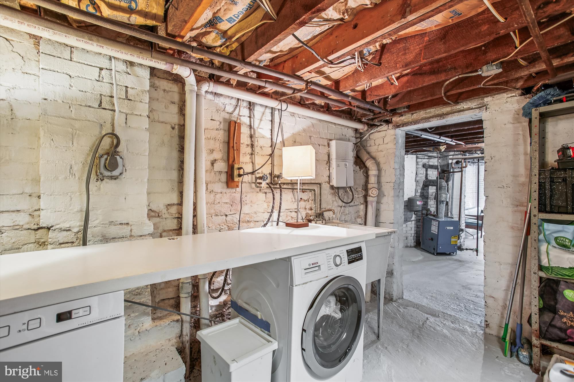 309 Elm Street Northwest Washington, DC 20001 - Photo 67 of 106 a view of a storage & utility room with washer and dryer