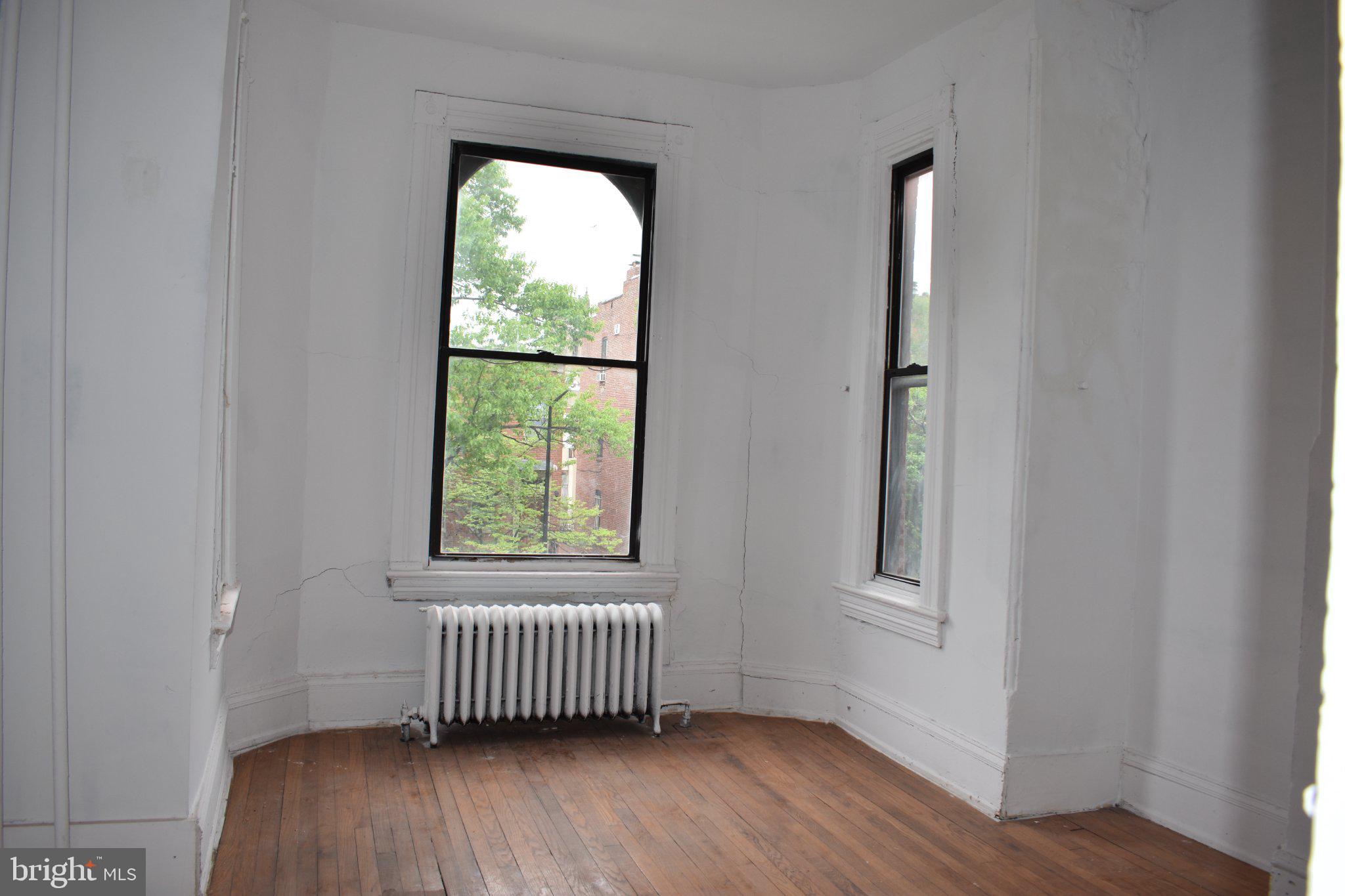 1605 15th Street Northwest Washington, DC 20009 - Photo 12 of 16 Bright, airy corner room with charm.