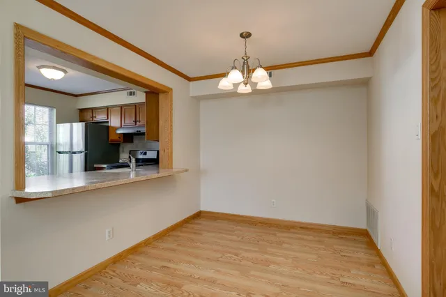 a view of a kitchen with a sink