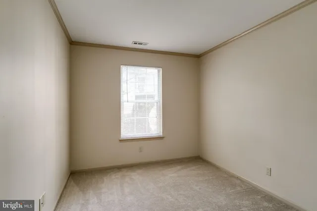 a view of small space with racks on the wall