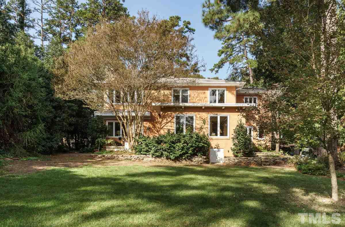 1508 Canterbury Road Raleigh, NC 27608 - Photo 3 of 25 All 4 bedrooms overlook the gently sloping, landscaped lawn, as do the Sun, Family and Living rooms that open onto two patios.